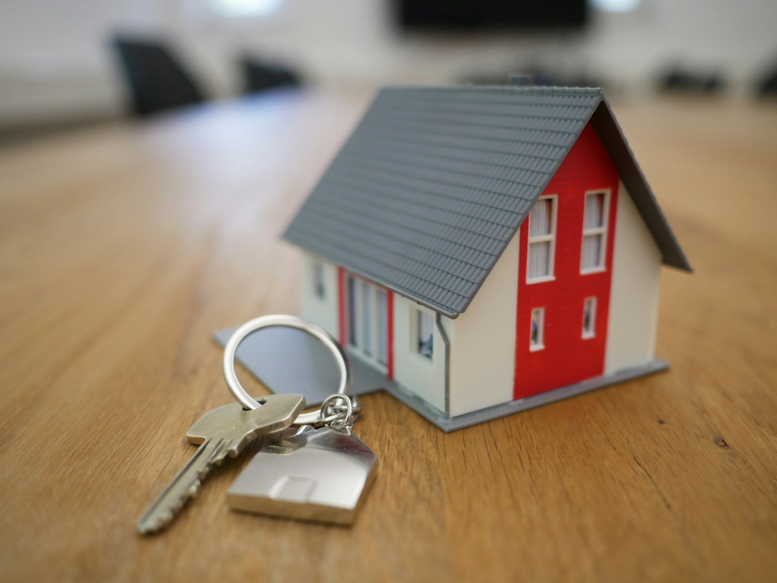 A happy couple receiving keys to their new home